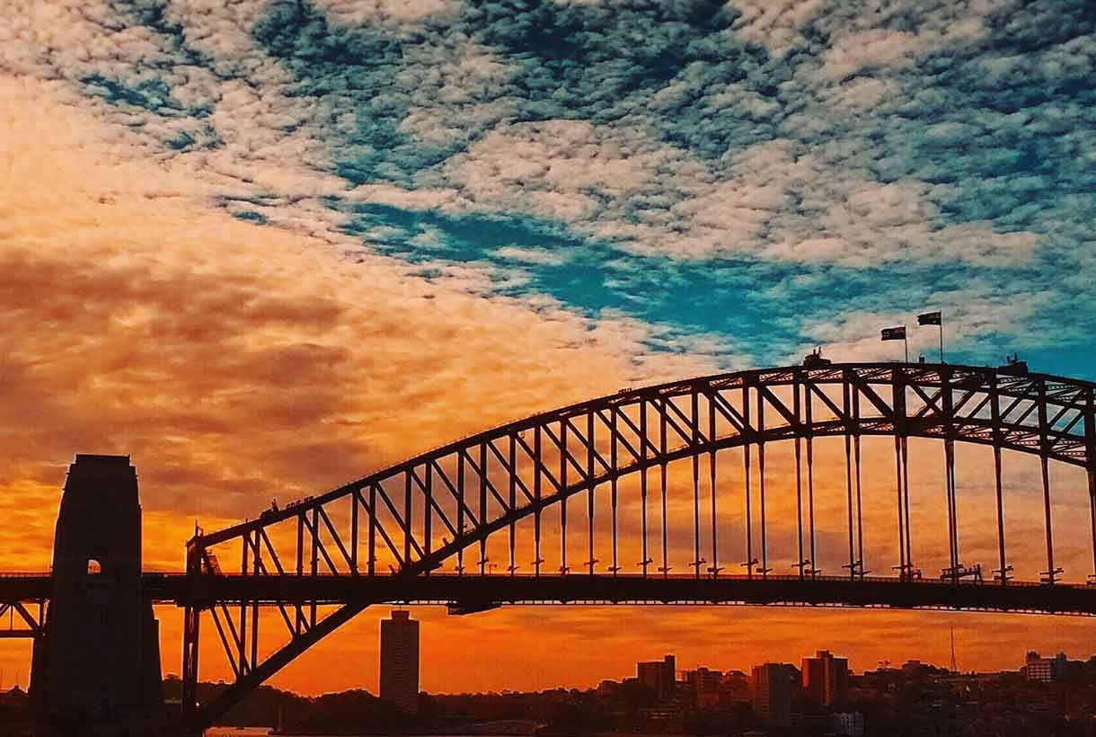 sunset photo of sydney harbour bridge